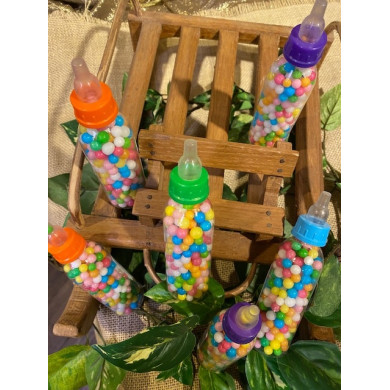 Biberon garni de perles de sucre